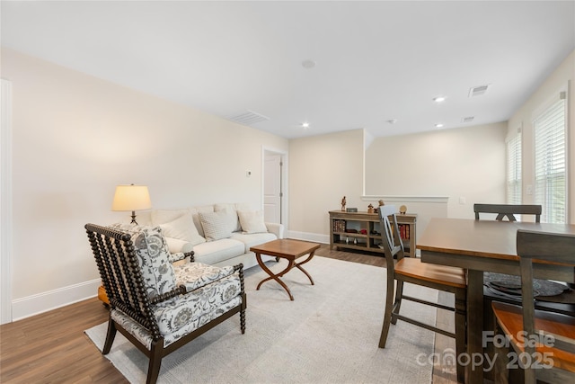 living room with hardwood / wood-style flooring