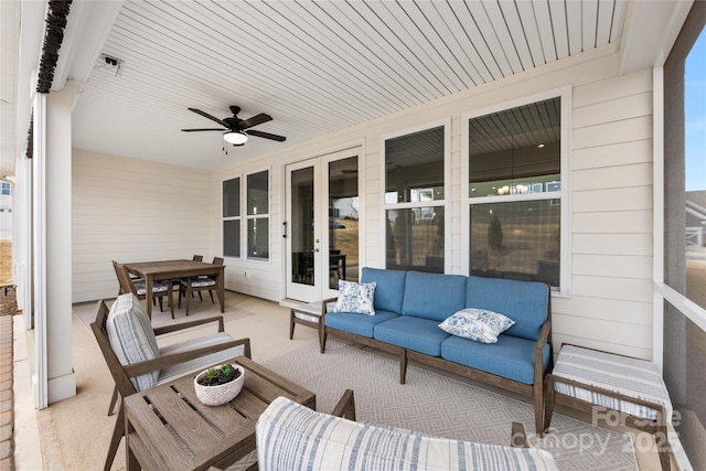 view of patio featuring outdoor lounge area, ceiling fan, and french doors