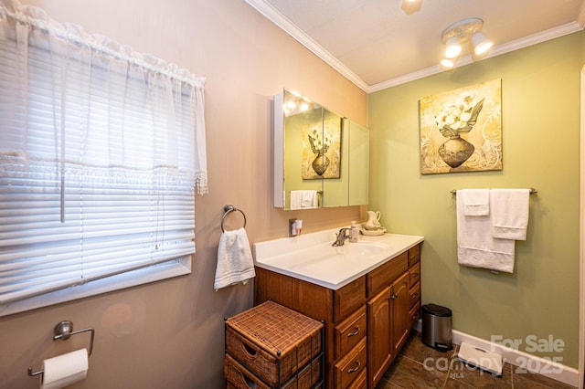 bathroom with vanity, crown molding, and tile patterned floors