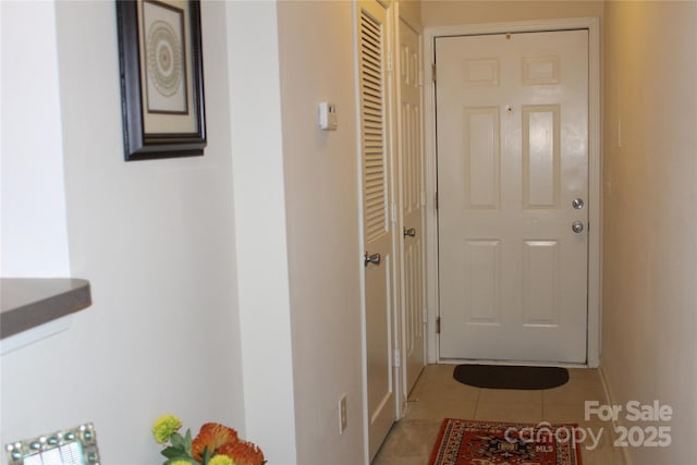 interior space featuring tile patterned flooring