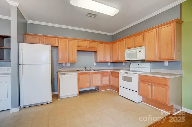 kitchen featuring crown molding, washer / clothes dryer, white appliances, and sink