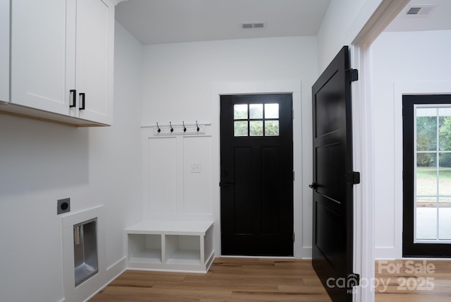 mudroom with light wood-type flooring