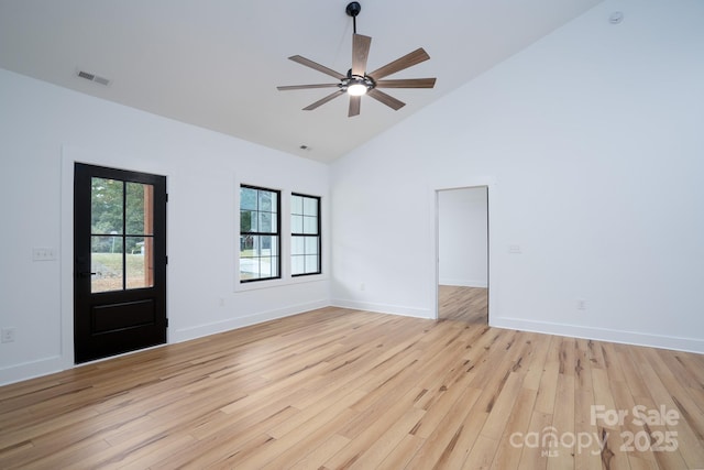 interior space featuring high vaulted ceiling, ceiling fan, and light wood-type flooring