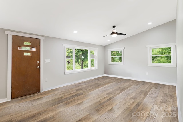 interior space featuring lofted ceiling, light hardwood / wood-style flooring, and ceiling fan