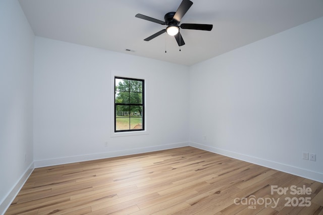 unfurnished room with light hardwood / wood-style floors and ceiling fan