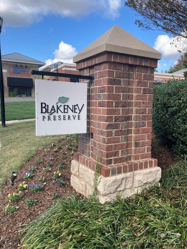 view of community sign