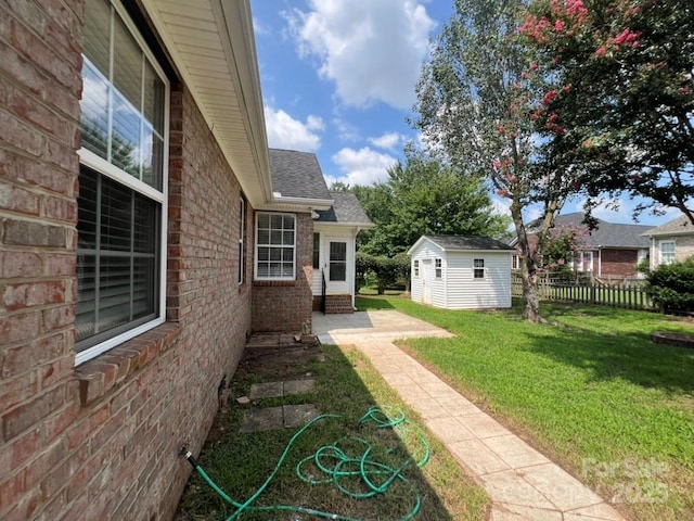 view of yard with a shed