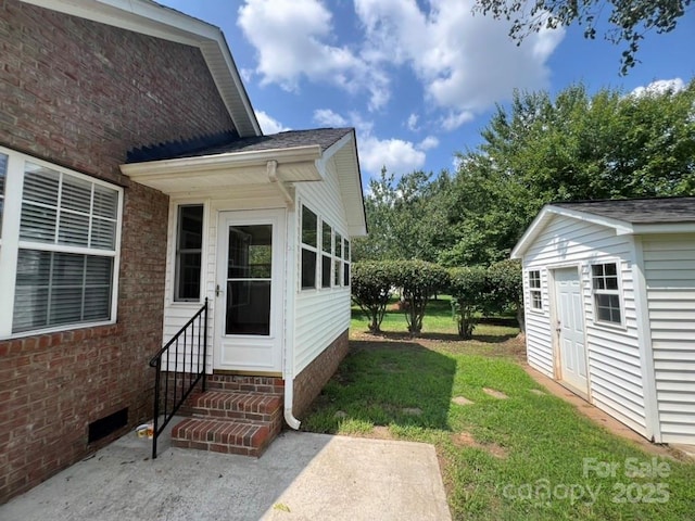 exterior space featuring a lawn