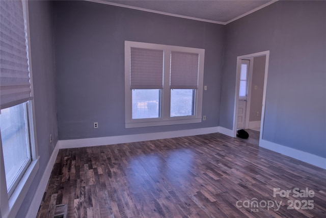 unfurnished room with crown molding and dark hardwood / wood-style floors