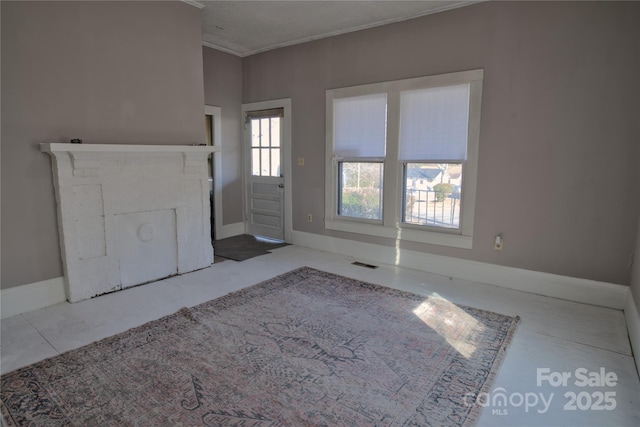 foyer with a textured ceiling