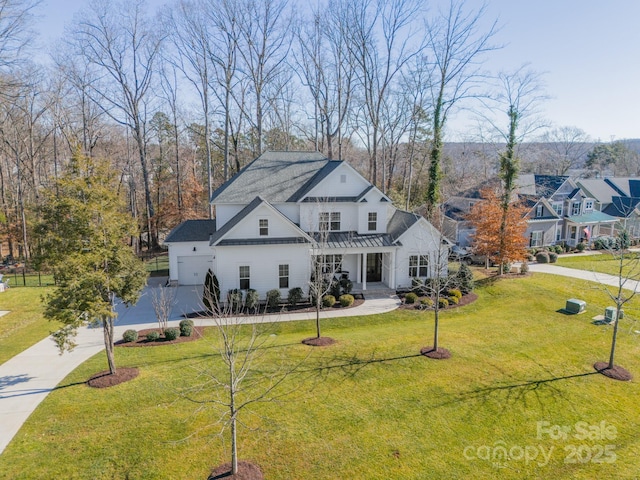 view of front of property featuring a front lawn and a pergola