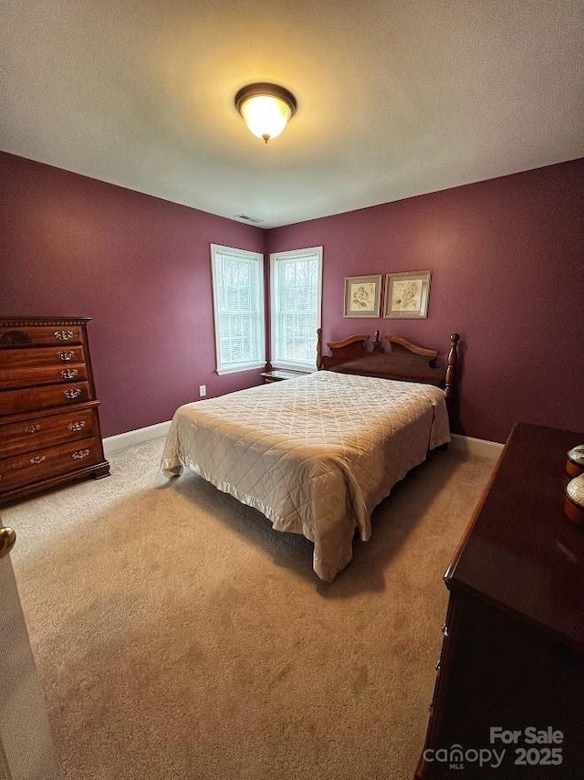 bedroom featuring carpet