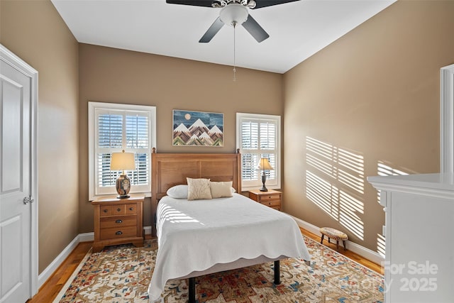 bedroom featuring ceiling fan and wood-type flooring