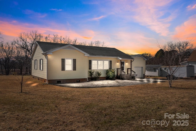 ranch-style house with a yard