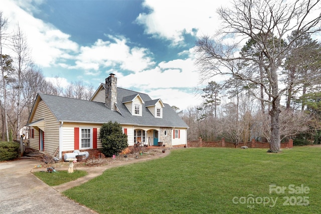 cape cod-style house with covered porch and a front lawn