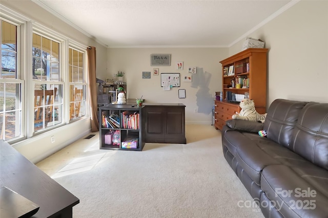 carpeted living room featuring ornamental molding and a healthy amount of sunlight