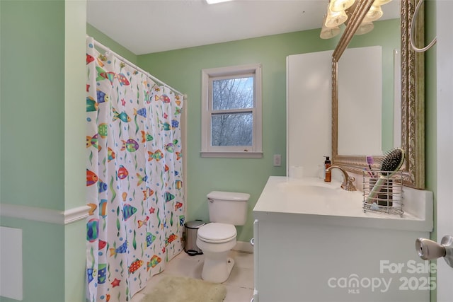 bathroom featuring vanity, tile patterned floors, toilet, and a shower with shower curtain