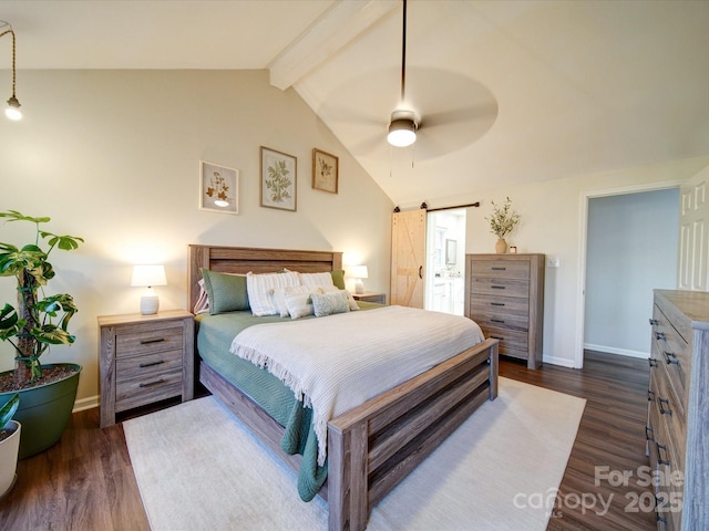 bedroom with ceiling fan, a barn door, lofted ceiling with beams, and dark hardwood / wood-style flooring