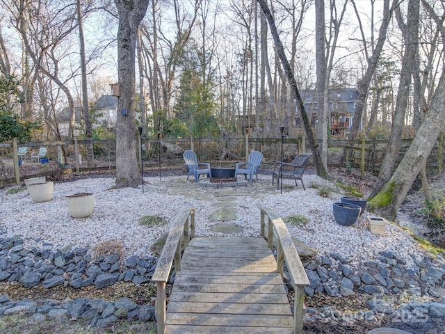 view of yard with an outdoor fire pit