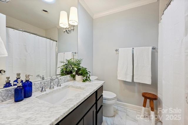 bathroom featuring toilet, vanity, and crown molding