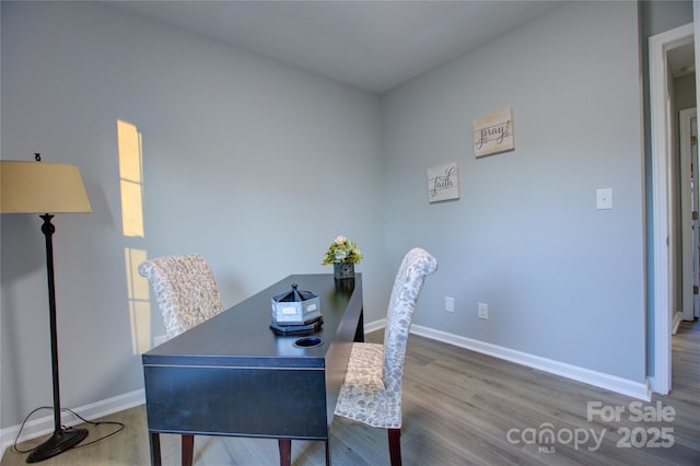 dining area featuring hardwood / wood-style flooring