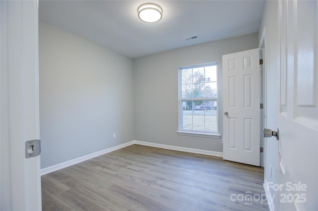 empty room featuring light hardwood / wood-style flooring