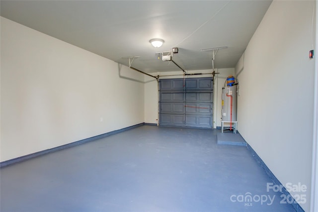 garage featuring water heater and a garage door opener