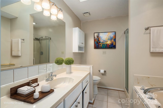 full bathroom with tile patterned floors, independent shower and bath, toilet, and vanity