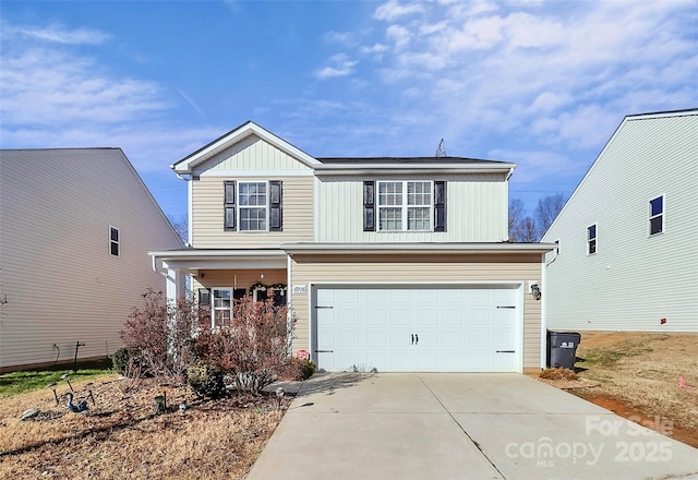 front of property with a garage