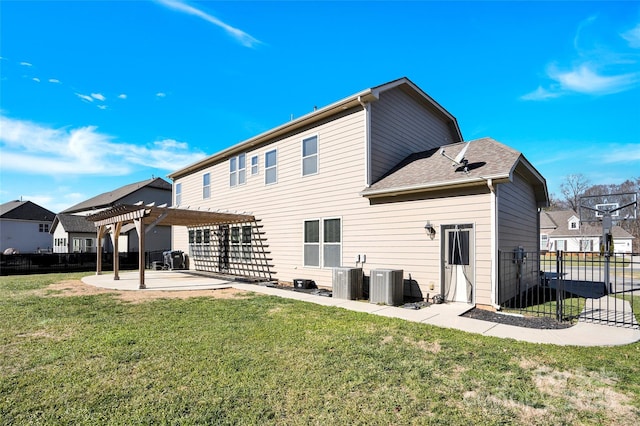 rear view of property with a patio area, cooling unit, a yard, and a pergola