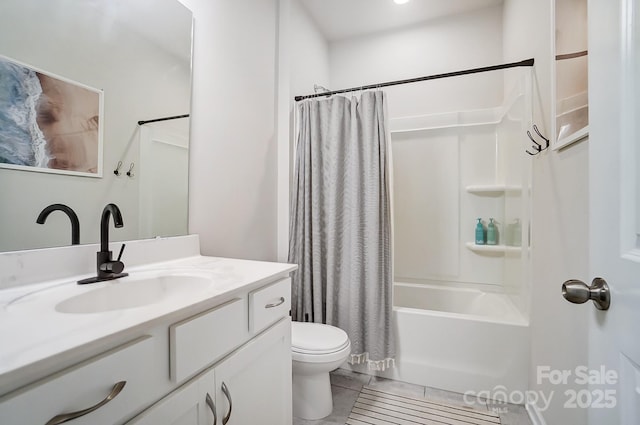 full bathroom featuring tile patterned flooring, shower / bath combo, vanity, and toilet