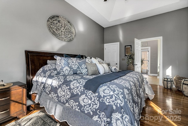 bedroom featuring dark wood-type flooring