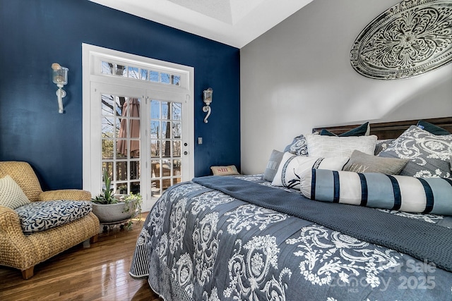 bedroom featuring dark hardwood / wood-style flooring