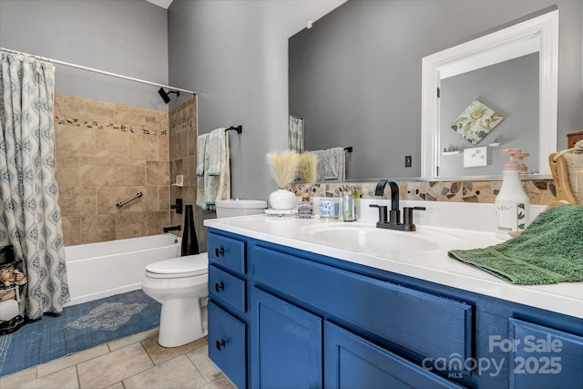 full bathroom with vanity, tile patterned floors, toilet, and shower / bath combo with shower curtain