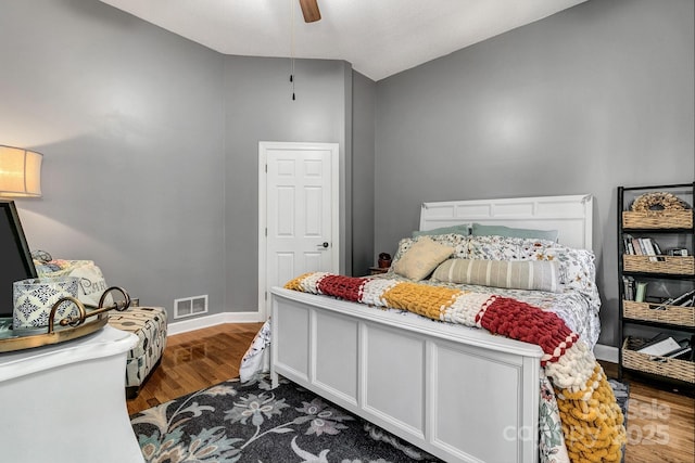 bedroom featuring hardwood / wood-style flooring and ceiling fan