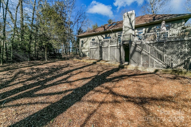 view of yard with a wooden deck