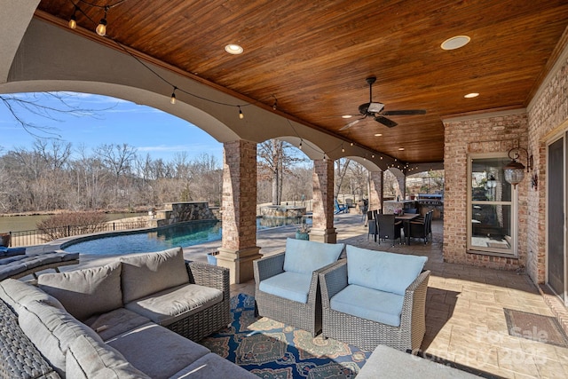 view of patio featuring outdoor lounge area and ceiling fan