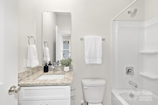 full bathroom with vanity,  shower combination, and toilet