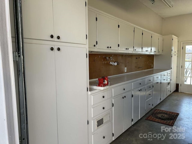 kitchen with white cabinets