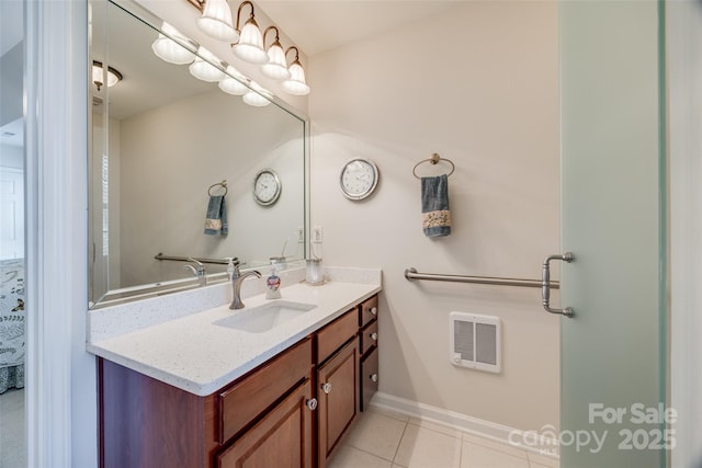 bathroom with vanity and tile patterned flooring