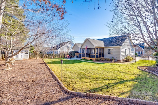 view of yard with a sunroom