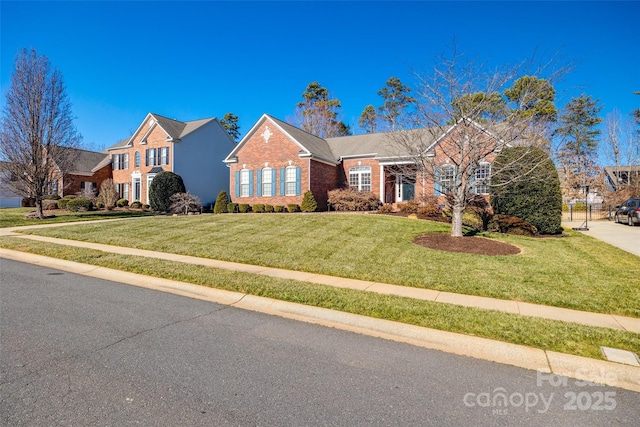 view of front of home featuring a front lawn