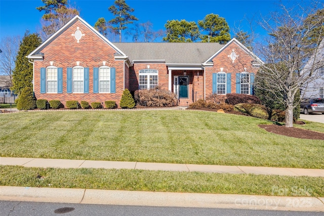 view of front of home featuring a front lawn