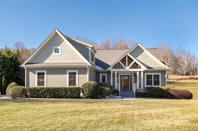 craftsman inspired home with a front yard