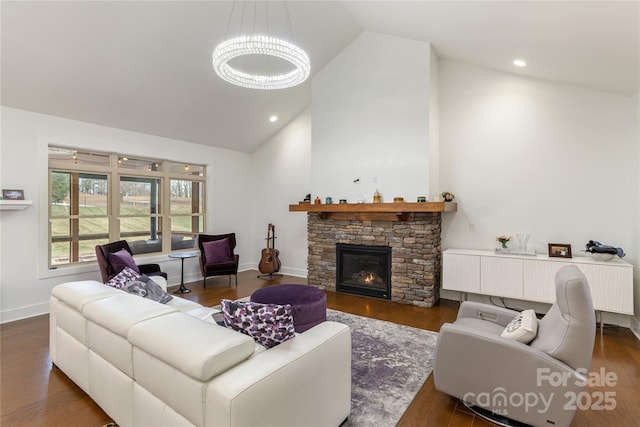 living room with radiator heating unit, a stone fireplace, high vaulted ceiling, and dark hardwood / wood-style flooring