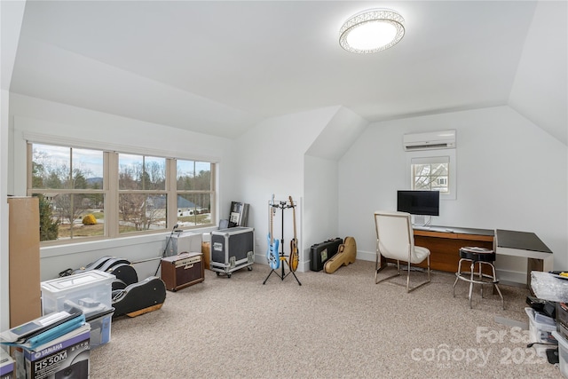 home office featuring vaulted ceiling, an AC wall unit, and carpet