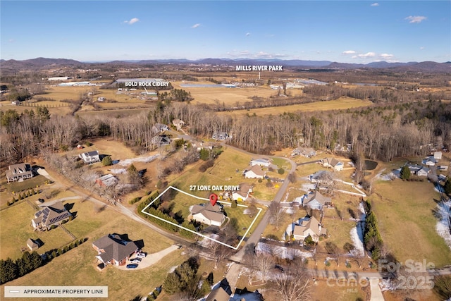 aerial view featuring a mountain view