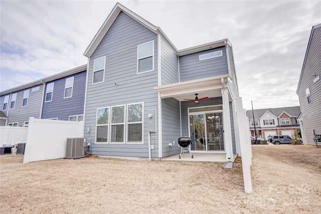 back of house featuring ceiling fan, central air condition unit, and a patio area