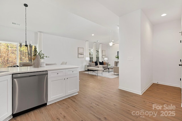 kitchen with pendant lighting, ceiling fan, dishwasher, white cabinetry, and light wood-type flooring