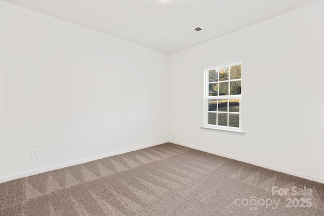 view of carpeted spare room